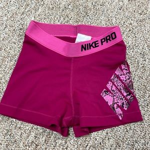pink NIKE pros